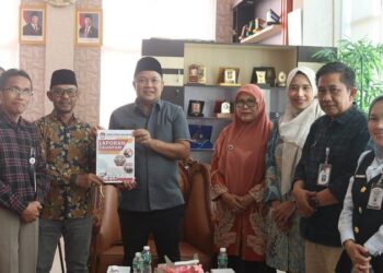 KPU Dharmasraya Serahkan Laporan Hasil Pilkada 2024 ke DPRD