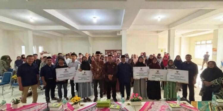 BAZNAS Bukittinggi Salurkan Zakat Rp107 Juta untuk 125 Mustahik