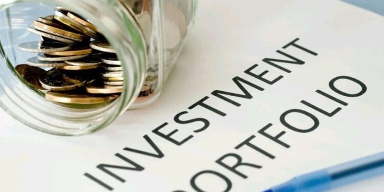 Foto bertuliskan investment portfolio.[foto : ist]