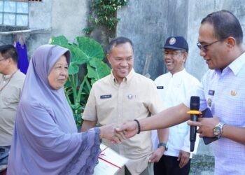Pemko dan BPN Bukittinggi Serahkan Sertipikat Pengganti untuk Korban Kebakaran di Birugo