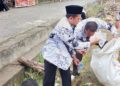 Wabup Solok Pimpin Aksi Bersih-Bersih pada Peringatan HUT PGRI dan Hari Guru Nasional 2025