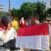 Gelorakan Semangat Nasionalisme, 500 Bendera Dibagikan Kepada Warga di Dharmasraya