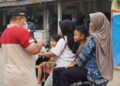 Terdampak Kabut Asap, 5.000 Masker Gratis Dibagikan untuk Warga Dharmasraya